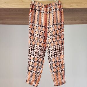 BCBGeneration Orange and Black Patterned Cropped Pants